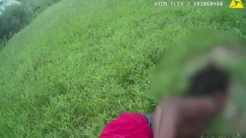 A screengrab from the officer's body camera as he pinned the boy to the ground.