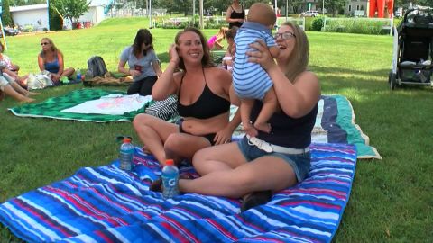 Mary Davis, left, and Stephanie Buchanan staged a protest after they were scolded for breastfeeding at a public pool in Minnesota.
