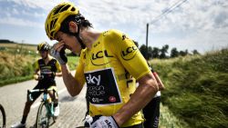 Great Britain's Geraint Thomas cleans his eyes after tear gas was used during a farmers' protest who attempted to block the stage's route, during the 16th stage of the 105th edition of the Tour de France cycling race, between Carcassonne and Bagneres-de-Luchon, southwestern France, on July 24, 2018. - The race was halted for several minutes on July 24 after tear gas was used as protesting farmers attempted to block the route. (Photo by Marco BERTORELLO / AFP)        (Photo credit should read MARCO BERTORELLO/AFP/Getty Images)