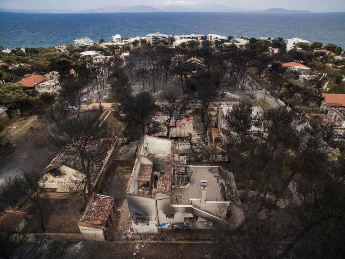 An aerial view shows burned-out houses in Mati.