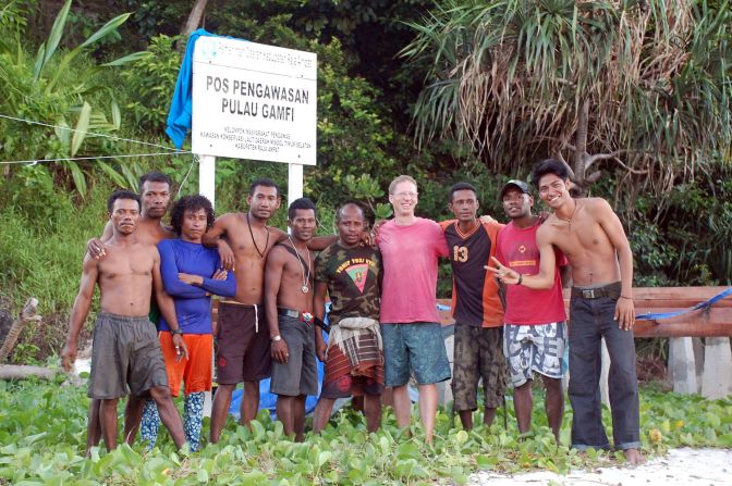Jamie mixes with locals at Gamfi island, part of the Raja Ampat archipelago in Indonesia.