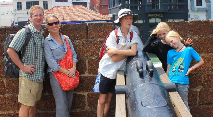 The family poses in the state of Malacca in Malaysia in 2014. Niall (center with hat) recently moved on from life at sea to pursue his university degree in Portland, Oregon. 