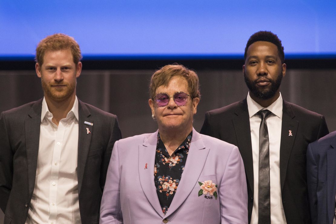 Sir Elton John (m), Harry, Duke of of Sussex (l) and Nelson Mandela's grandson Ndaba Mandela (r), on stage together during the International AIDS Conference in Amsterdam.
