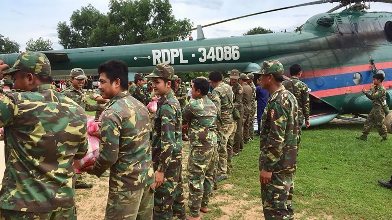 Laotian military forces prepare for rescue efforts after the dam collapse. 