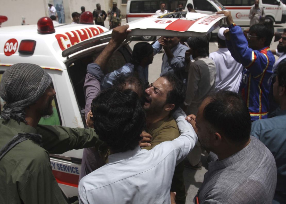 A man mourns the death of a relative at the site of a bombing in Quetta, Pakistan, on Wednesday.