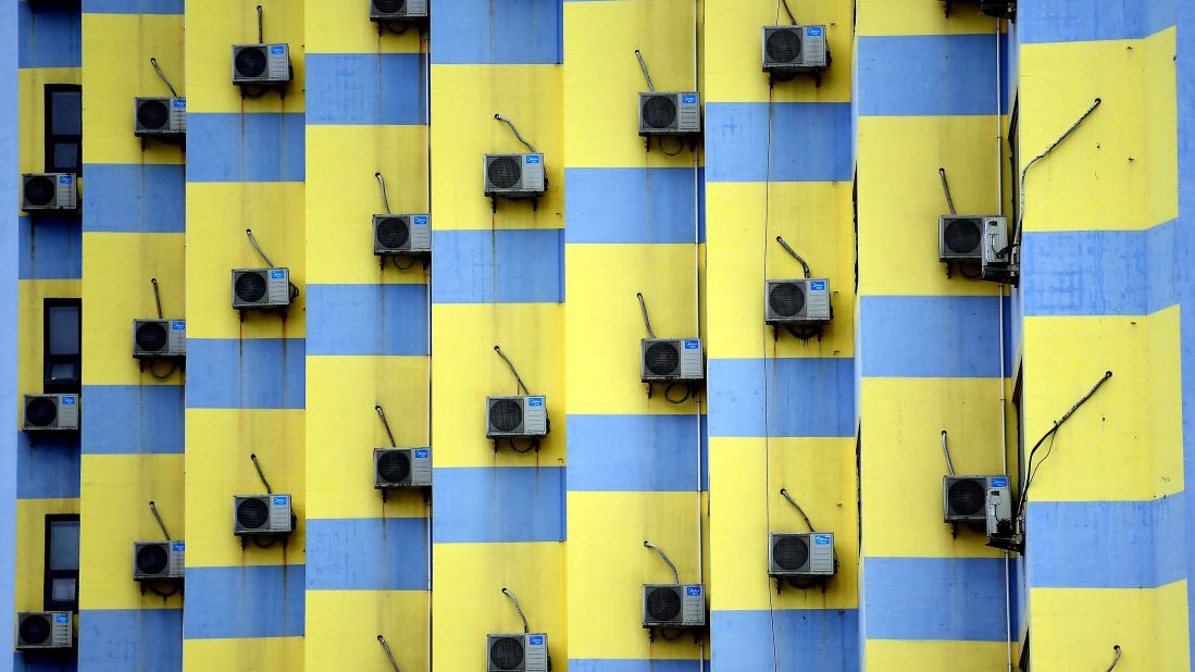 <strong>Shenyang, China:</strong> Another city of imperial treasures, Shenyang, in northeast China's Liaoning Province, also has some eye-catching modern installations, such as these air conditioners spotted on the wall of a brightly decorated building.