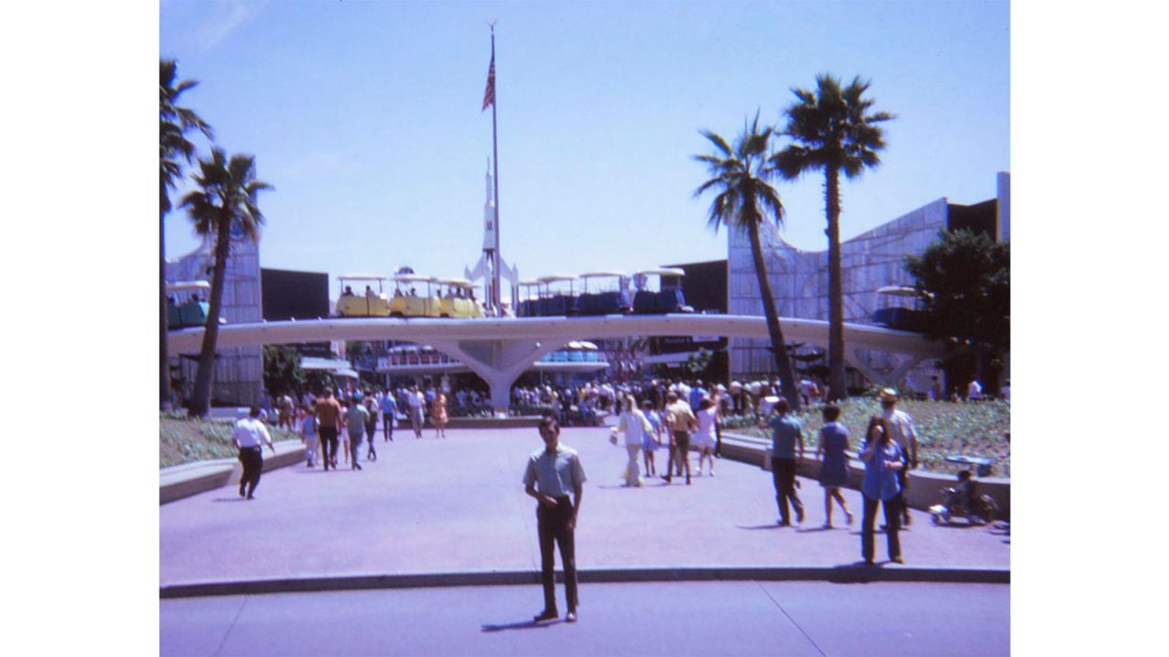 The photos are mostly of Judy, but there's the odd one of Larry -- including this one, in front of Tomorrowland. 
