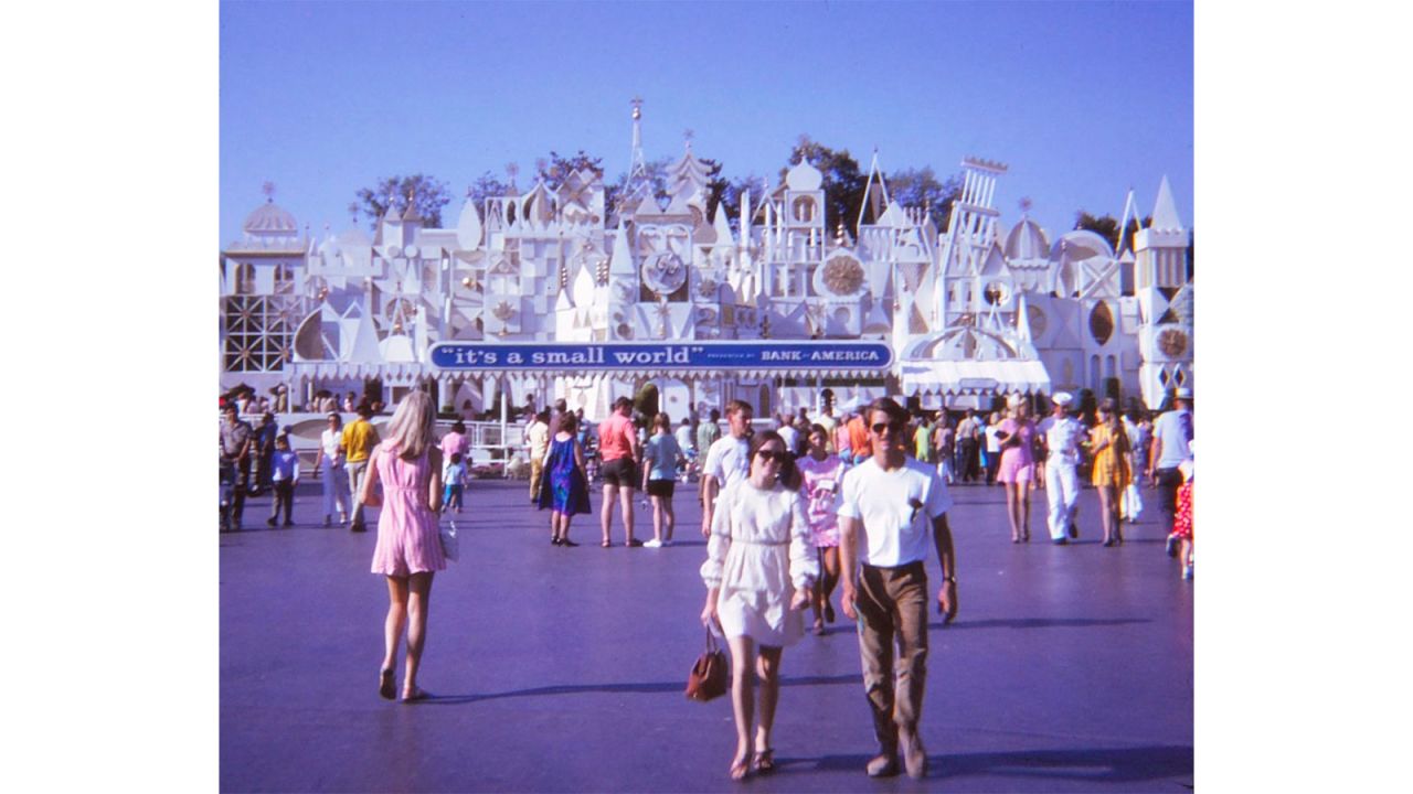Larry Syverson snapped this shot of his future wife Judy, pictured left, walking towards "It's a Small World."