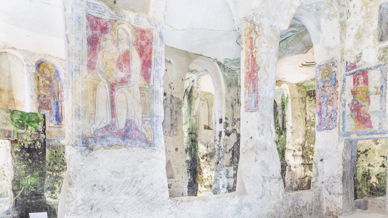 Churches carved into the rock are adoned with rudimentary art works.