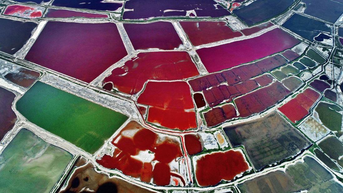 <strong>Yungcheng City, China:</strong> An abstract-looking, multicolored Salt Lake is spotted over Yuncheng in China's<strong> </strong>Shanxi Province, west of Beijing. The lake changes color as water density fluctuates.
