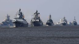 Russian navy ships, among them Russian Navy Frigate 'Admiral Gorshkov (2L), sail near Kronshtadt naval base outside Saint Petersburg on July 20, 2018, (Photo by OLGA MALTSEVA / AFP)      