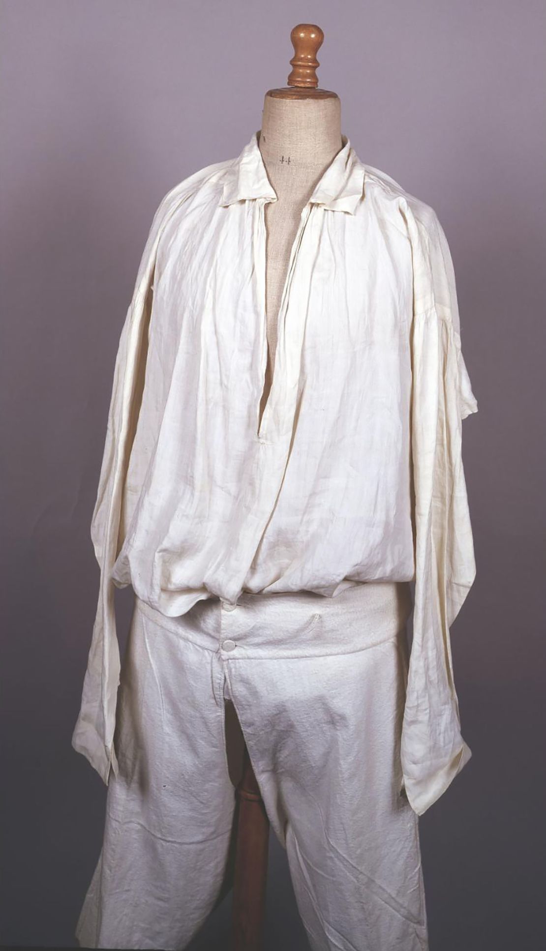 Shirt and long johns worn by Emperor Napoleon I on St. Helena island. The shirt is stained with blood. Napoleon wore it at the very end of his life. Both pieces are embroidered with the imperial initials.
