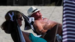 CHICHESTER, ENGLAND - JULY 23: Beachgoers lie in the sun on West Wittering Beach during hot weather on the first day of the Summer school holidays on July 23, 2018 in Chichester, England. Today has been the hottest day of 2018 with temperatures rising to 33.3 degrees celsius in some areas. The Met Office have issued an amber weather warning to stay out of the sun between now and Friday as temperatures could continue to rise to 35 degrees celsius. (Photo by Jack Taylor/Getty Images)