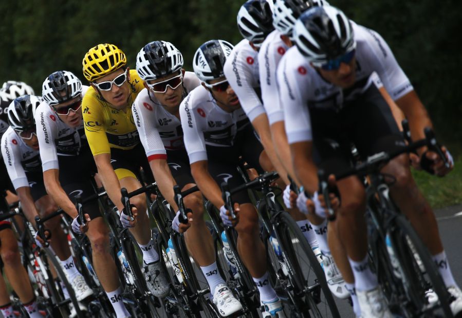 Team Sky, with Geraint Thomas wearing the yellow jersey, rides together during the 14th stage on Saturday, July 21.