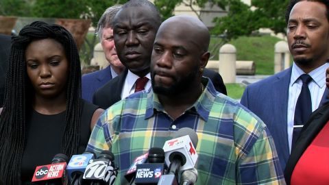 Michael McGlockton speaks about the death of his son, Markeis McGlockton, Thursday in Clearwater, Florida. Behind him is attorney Benjamin Crump; at left is Markeis' girlfriend, Britany Jacobs.
