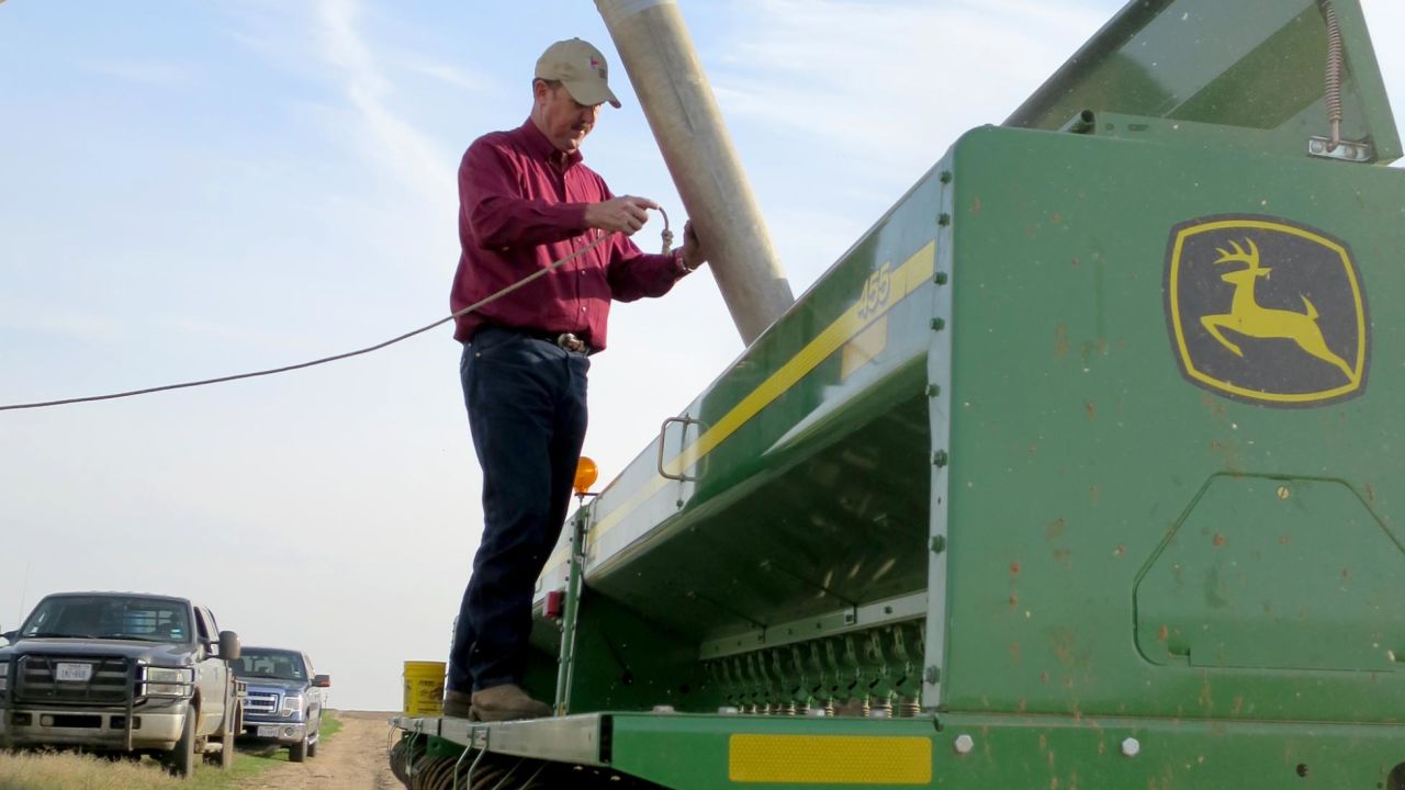 Texas farmer Russell Boening is storing his grain sorghum instead of shipping it to China because prices have plummeted.