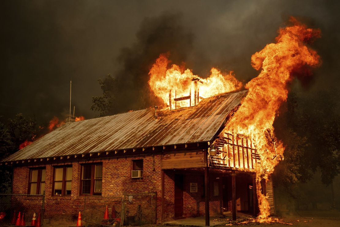 Flames engulf a historic schoolhouse Thursday in Shasta, California.