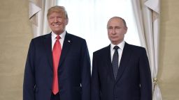 US President Donald Trump (L) and Russia's President Vladimir Putin pose ahead a meeting in Helsinki, on July 16, 2018. - The US and Russian leaders opened an historic summit in Helsinki, with Donald Trump promising an "extraordinary relationship" and Vladimir Putin saying it was high time to thrash out disputes around the world. (Photo by Alexey NIKOLSKY / Sputnik / AFP)        (Photo credit should read ALEXEY NIKOLSKY/AFP/Getty Images)