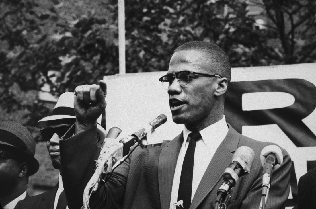 Malcolm X speaks at an outdoor rally, circa 1963.