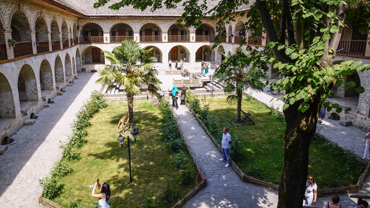 <strong>Courtyard:</strong> Traders' camels and other animals were once kept in the central courtyard. Today it's a peaceful spot filled with trees and seating areas. 