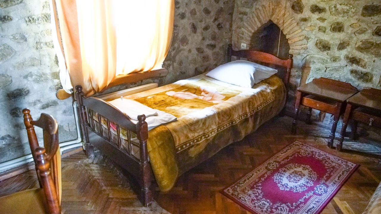 <strong>Bedroom:</strong> The rooms have plenty of atmosphere, but facilities are very basic. It's a taste of the country's Soviet past as well as the 18th century. 