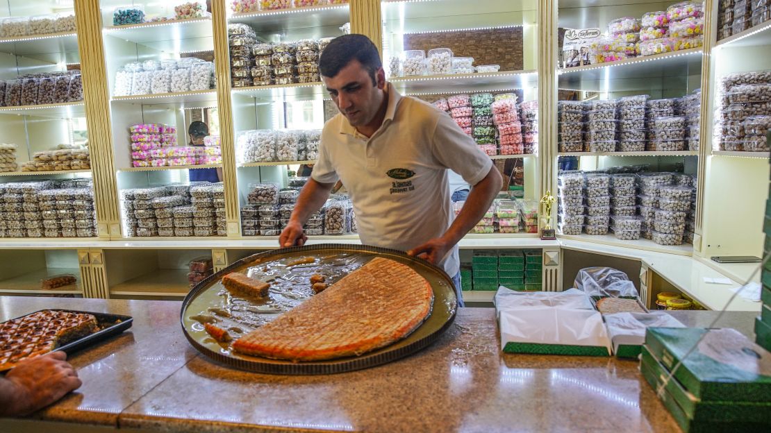 Locals head to Aliahmed Sweets to buy their halva and other treats.