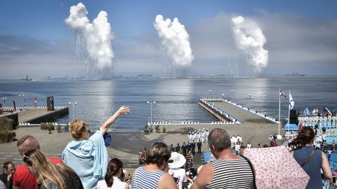 Spectators watch the naval parade marking Russian Navy Day. 