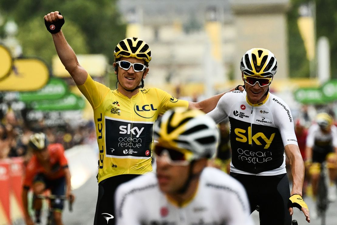 Tour de France winner Geraint Thomas wearing the overall leader's yellow jersey and third-placed Chris Froome, the 2017 champion cross the finish line of 21st and last stage of the 105th edition of the Tour de France.