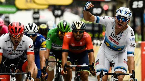 Norway's Alexander Kristoff celebrates as he crosses the finish line to win the 21st and last stage of the 105th edition of the Tour de France cycling race between Houilles and Paris Champs-Elysees.