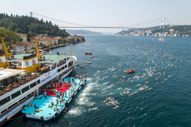 Aerial photo shows swimmers  during the 30th Samsung Cross-Continental Swimming Race organized by the Turkish Olympic Committee in Istanbul on Sunday, July 22. 