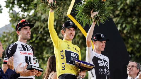 Geraint Thomas is flanked by second-placed Dutchman Tom Dumoulin and his Team Sky teammate Chris Froome on the podium in Paris.