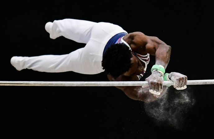 Cuba's Manrique Larduet competes in the gymastics horizontal bar event during the 2018 Central American and Caribbean Games in Barranquilla, Colombia, on Tuesday, July 24. 