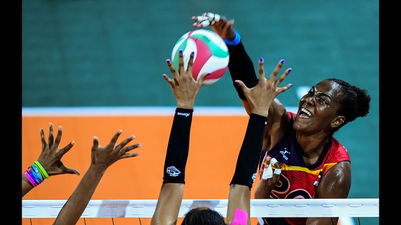 Dominican Republic's Brayelin Martinez spikes the ball during the women's volleyball match against Colombia during the 2018 Central American and Caribbean Games in Barranquilla, Colombia, on Wednesday, July 25.