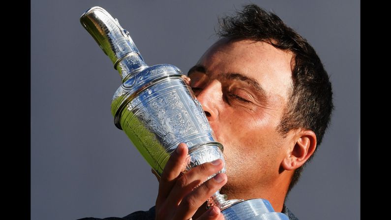 Francesco Molinari of Italy kisses the Claret Jug as champion golfer after winning the 147th Open Championship at Carnoustie Golf Club on Sunday, July 22, in Scotland. 