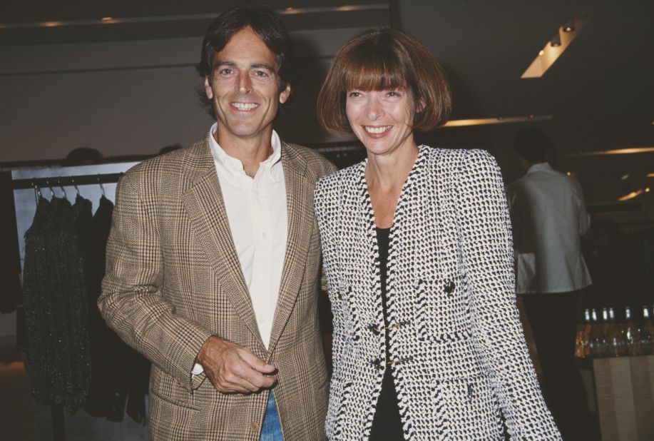 Gene Pressmen (CEO and creative director of Barneys New York at the time) poses for a photo with Wintour during a cocktail party at the department store in the late 80s.