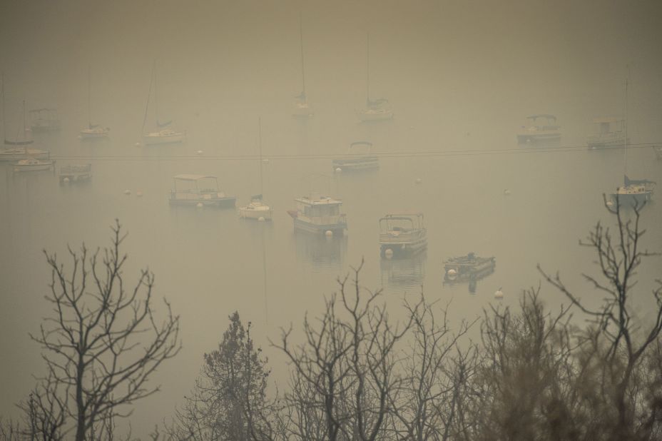 Boats sit at Whiskeytown Lake, near where the Carr Fire originated, on Sunday, July 29.