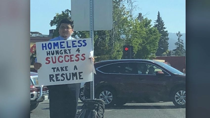 homeless man hands out resumes mxp vpx_00000000.jpg
