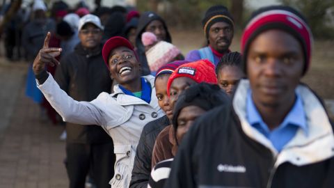 Zimbabweans line up to vote at the Fitchela Primary School in Kwekwe on Monday. 