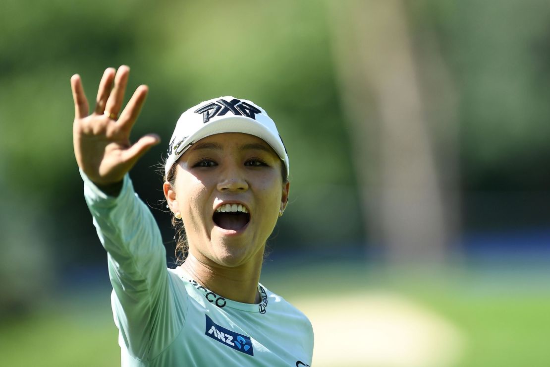 Lydia Ko of New Zealand waves to a fan as she walks up the ninth fairway during the second round of the KPMG Women's PGA Championship