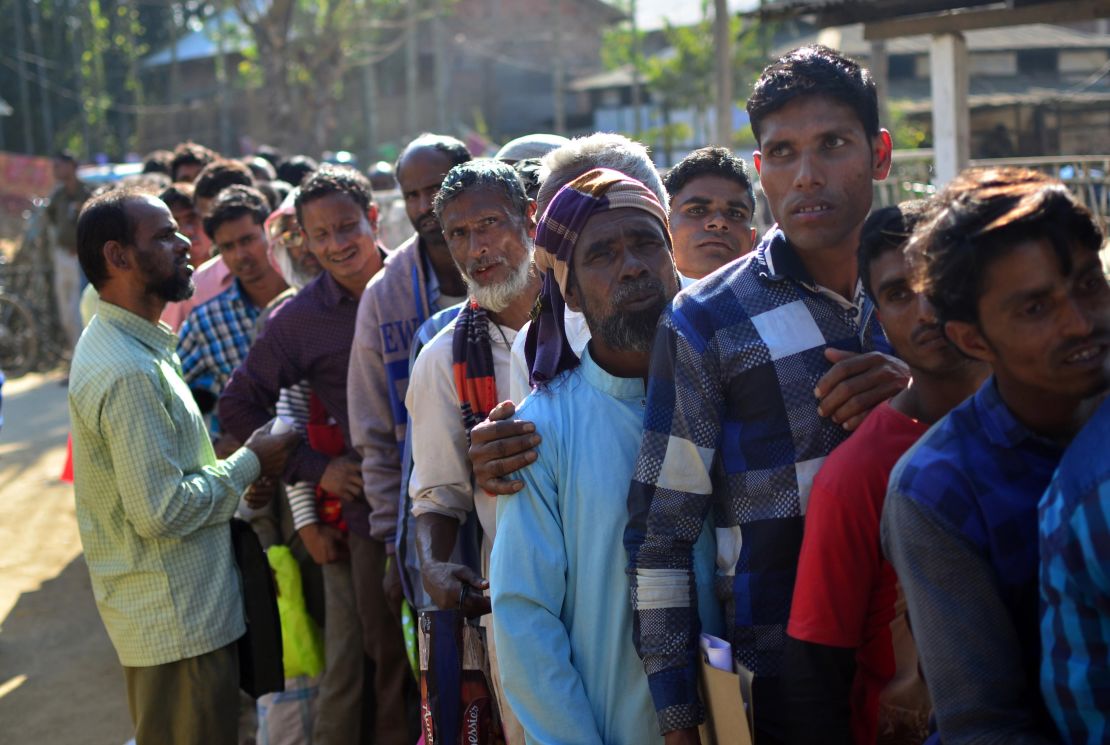 Assam is the only state in India to have a citizenship register. Villagers in Assam stand in line to check their names on the first draft of NRC in 2018.