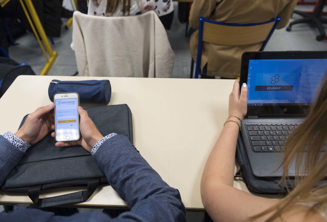 High school students with their smartphones and tablet computers at the vocational school in Bischwiller, eastern France.   