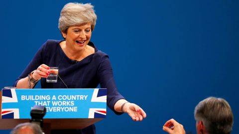 Theresa May accepted a cough sweet during a speech in 2017.