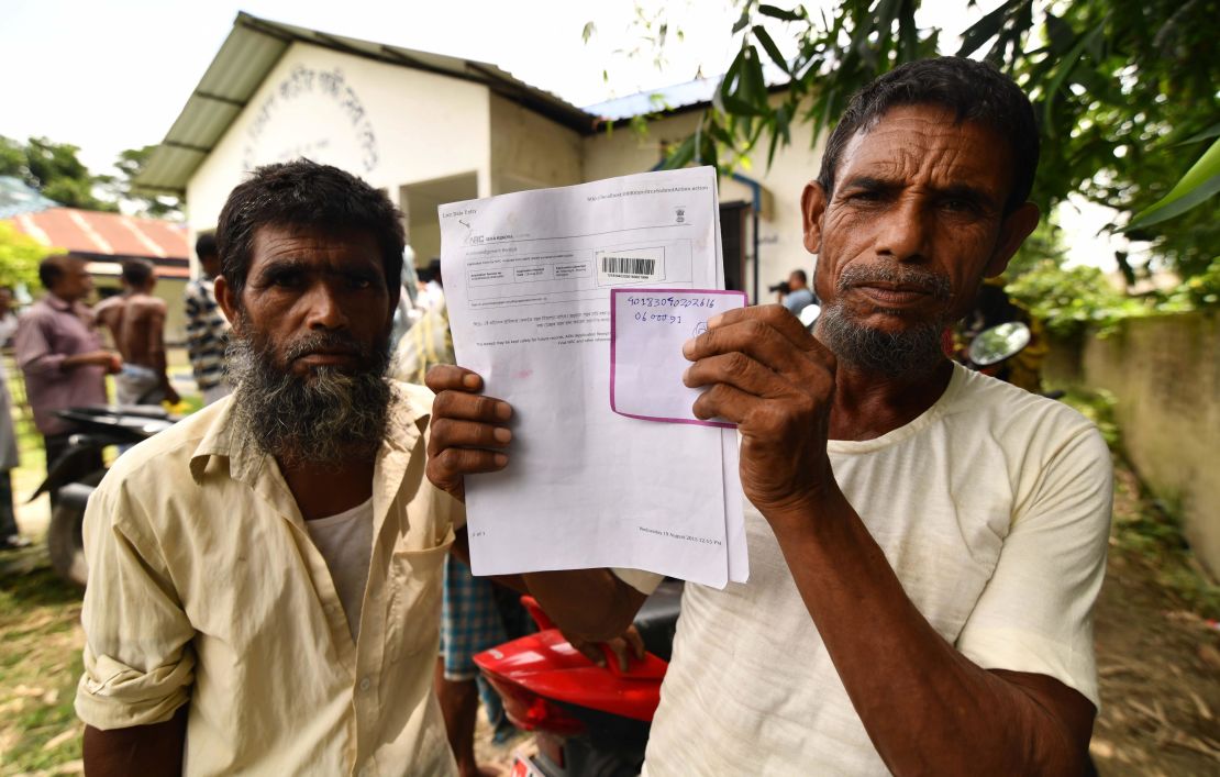 Assam is the only state in India to have a citizenship register. Villagers in Assam stand in line to check their names on the first draft of NRC in 2018.