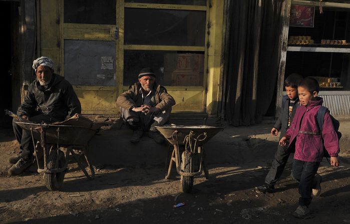 Schoolchildren walk to class in the old city of Kabul in Afghanistan.