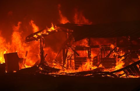 A barn burns on Tuesday, July 31, as the River Fire moves through Lakeport.