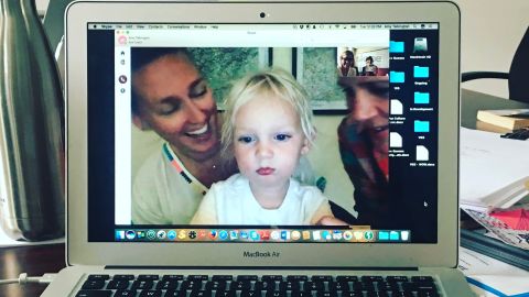 Writer Liz Tigelaar video chats with her son while she works on a pilot project.