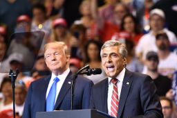 Rep. Lou Barletta stands beside President Donald Trump at a political rally in Pennsylania in August. 