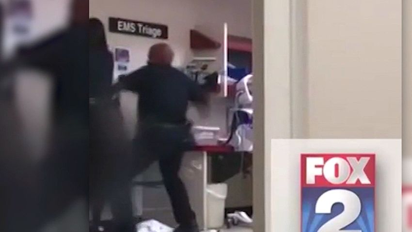 detroit cop punches woman