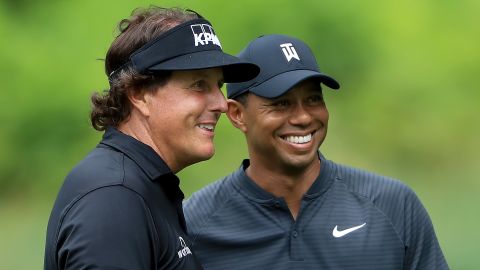 Phil Mickelson (left) and Tiger Woods played a practice round together at Firestone Country Club.