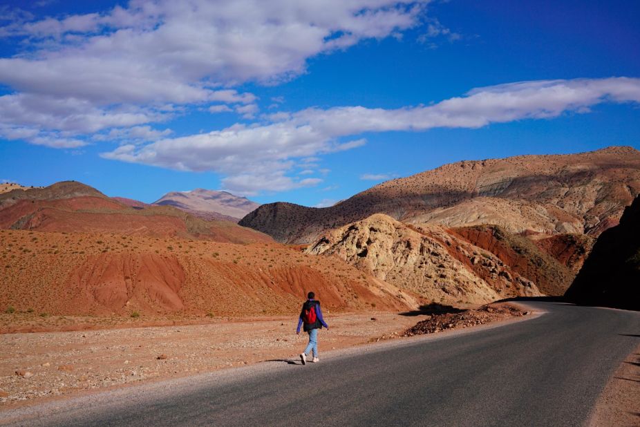 A child walks home from school through the mountains around Telouet Kasbah in Morocco.